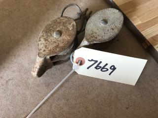 Selling Off- Site -  (2) Vintage Pulleys.  Location - 527 North 200 East, Raymond, AB -  For Further Information Please Call Chris 403-308-1161.