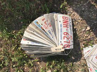 Selling Off- Site -  Bundle of License Plates Appproximately (35) Not Legal For Road Use.  Location - 527 North 200 East, Raymond, AB -  For Further Information Please Call Chris 403-308-1161.