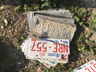 Selling Off- Site -  Bundle of License Plates Appproximately (35) Not Legal For Road Use.  Location - 527 North 200 East, Raymond, AB -  For Further Information Please Call Chris 403-308-1161.