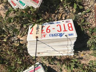 Selling Off- Site -  Bundle of License Plates Appproximately (35) Not Legal For Road Use.  Location - 527 North 200 East, Raymond, AB -  For Further Information Please Call Chris 403-308-1161.