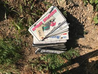 Selling Off- Site -  Bundle of License Plates Appproximately (35) Not Legal For Road Use.  Location - 527 North 200 East, Raymond, AB -  For Further Information Please Call Chris 403-308-1161.