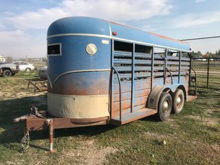 Selling Off- Site -  Stock Trailer, Requires Repair, No Serial Number.  Location - 527 North 200 East, Raymond, AB -  For Further Information Please Call Chris 403-308-1161.