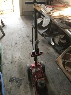 Selling Off- Site -  Air Over Hydraulic Jack, Working Condition Unknown.  Location - 527 North 200 East, Raymond, AB -  For Further Information Please Call Chris 403-308-1161.
