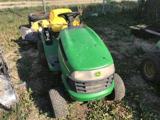 Selling Off- Site -  John Deere LA115 Lawn Tractor Running Condition Unknown.  Location - 527 North 200 East, Raymond, AB -  For Further Information Please Call Chris 403-308-1161.