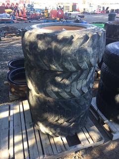 Set of (4) Skidsteer Tires w/ Rims 12 x 16.5 NHS.