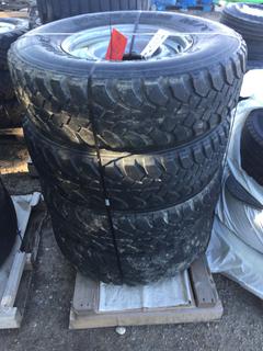 Set of (4) Bridgestone Dueler M/T Tires w/ Rims LT 235/85 R16.