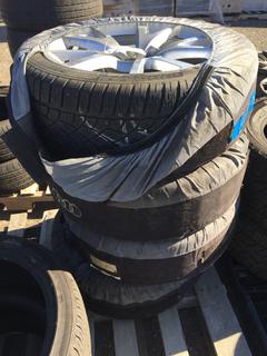 Set of (4) Dunlop Tires 235/45 R19 99V  w/ Audi Rims.