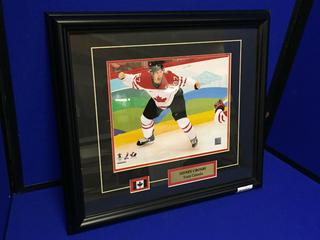 Sidney Crosby Team Canada Framed Photograph (15" x 17") & Dion Phaneuf Framed Photograph (19 1/4" x 16 1/2")
