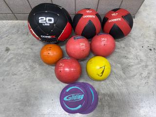 (8) Assorted Weighted Workout Balls & (4) Fitness Gliders.
