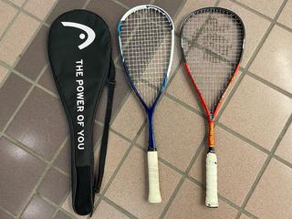 (2) Squash Rackets c/w (1) Cover.