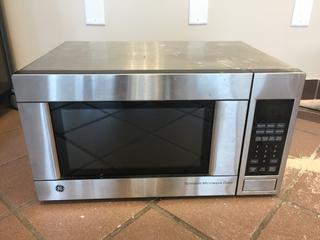 GE Model JES1140STC-01 1.1-Cubic Foot, 1100W Stainless Steel Microwave Oven.