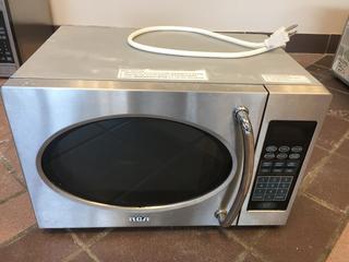 RCA Model RMW729 0.6-Cubic Foot, 700W Stainless Steel Microwave Oven.