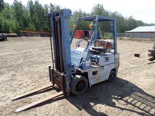 Komatsu FG25S LPG Lift Truck C/w Nissan/Komatsu 4-Cyl. Propane Engine, 2-Stage Mast, Side Shift And 4ft Forks. Showing 5598hrs. SN 61194 *Note: Seat Damaged*