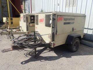 2005 Ingersoll-Rand XP375WIR Portable Air Compressor c/w 4.5L Diesel, 225/75D15 Tires, Showing 8593 Hours,  S/N 357801UFPA57.