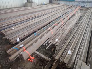 Quantity of Approximately 40'x4"x4" Steel Angles 1/4" Thickness & (1) Approx. 40'x4" Steel Angles, 3/8" Thickness. Note:  Lot Only Includes Steel Marked with  Orange Ribbon.