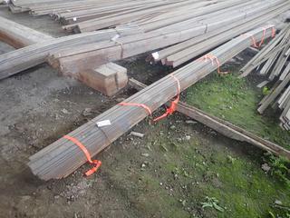 Quantity of Approximately 20'x2 1/2"x1/4" Steel Flat Bar. Note:  Lot Only Includes Steel Marked with Orange Ribbon.