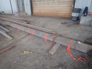 Quantity of Approximately 20'x2"x1/4" Steel Flat Bar. Note:  Lot Only Includes Steel Marked with Orange. Ribbon.