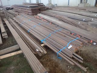Quantity of Approximately 24'x1 1/2"x1 1/2" & 20'x1"x1" Steel Square Channel, 1/8" Thickness. Note:  Lot Only Includes Steel Marked with Blue Ribbon. 