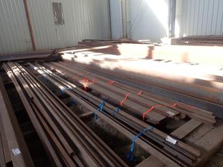 Quantity of (4) Steel C-Channels (3) Approx. 40'x7"x2", (1) 40'x8"x2" c/w (3) Steel I-Beams Approx. 40'x4"x2 1/2". Note: Lot Only Includes Steel Marked with Orange Ribbon.