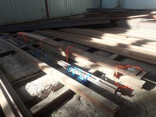 Quantity of (10) Sections of Steel Flat Bar (5) Approx. 20'x12"x1/2", (4) 20'x7"x3/8" & (1) 20'x7"3/4". Note: Lot Only Includes Steel Marked with Orange Ribbon.