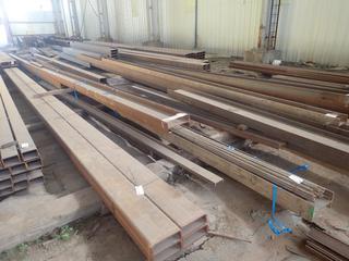 Quantity of Steel I-Beam (1) Approx. 60'x14 1/4"x6 3/4", (1) 70'x12 1/4"x6 3/4"., (2) Approx. 40'x16"x7" c/w (1) 22'x8"x2 1/2" & (1) 24'x5"x1 1/2" Sections of C-Channel. Note: Lot Only Includes Steel Marked with Blue Ribbon.