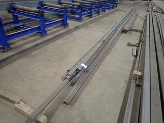 Quantity of Angle Steel Approx. 3 1/2"x2 1/2"x3/8" Lengths Up to 40' c/w (1) Steel Square Channel, Approx. 40'x"x3/8" Note: Lot Only Includes Steel Marked with Blue Ribbon.