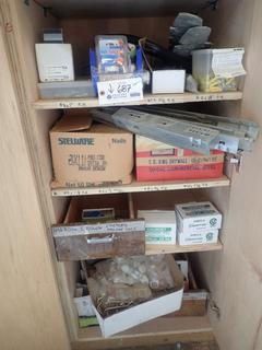 Qty Of Metal Wall Anchors, Nails, Staples And Misc Supplies *Note: Cabinet Not Included*