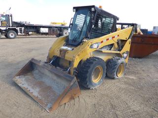 2014 CAT 252B3 Two Speed Skid Steer c/w Q/A Bucket, Showing 9,098 Hours, A/C Cab, 12-16.5 Tires, 2 at 90%, 1 at 10%, 1 Flat, SN CAT0252BTTNK02587 *Note: Seat Ripped* (PL0176)
