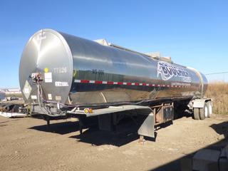 1999 Brenner 7000 Gallon Stainless Steel T/A Tank Trailer c/w DO 407 SS Spec, 3 In. Hyd Driven Pump, Spray Bar, Tires at 40%, VIN 10BFB72V7XF0A8458 *Note: Cracks In Rear Sub Frame*