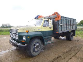 1982 Ford F-700 c/w 6.1L, Showing 278,776 Kms, PTO, 16Ft Wooden Grain Box, Hoist, GVWR 23,100 Lb, 207 In. W/B, 10R22.5 Tires at 10%, VIN 1FDNF70H7CVA33373 *Note: Turns Over, Does Not Start*