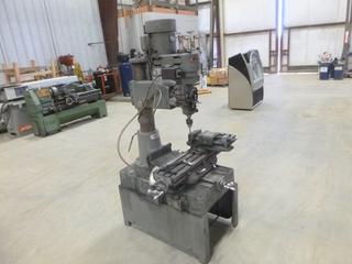 First Milling Machine, High / Low Speed Ranges, Forward and Reverse, Adjustable Feed Rate, Bed Adjustable North, South, East and West, Table 9In. x 42In.