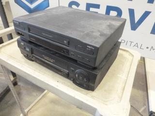 (1) Toshiba VHS Player, (1) JVC VHS Player (D1)