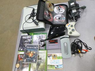 (1) 360 Console w/ Cords, (2) Headsets - 1 PS, (3) 360 Games, (1) PS# Game, (1) Xbox One Game, (1) Super Nintendo Game, (1) Xbox Game, (1) 360 Hard Drive, (1) Intercoder, (1) Wii Game