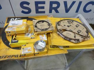 Assortment of Caterpillar Parts, Includes Gaskets, Rings, Sleeves, Clamps and More *Note: 2 Rings have Rust* (D-1)
