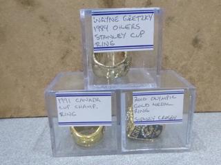 (1) 1984 Wayne Gretzky Stanley Cup Replica  Ring, (1) 1991 Canada Cup Championship Replica Ring, (1) 2010 Sidney Crosby Olympic Gold Medal Replica  Ring (Office)