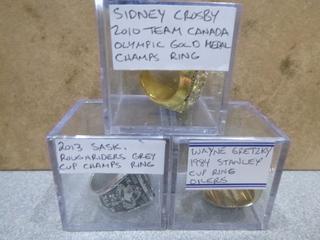 (1) 1984 Wayne Gretzky Stanley Cup Replica  Ring, (1) 2013 Saskatchewan Roughriders Grey Cup Replica Ring, (1) 2010 Sidney Crosby Team Canada Olympic Gold   Replica Ring (Office)