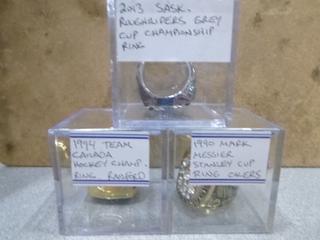 (1) 1990 Mark Messier Stanley Cup Replica Ring, (1) 2013 Saskatchewan Roughriders Grey Cup Replica Ring, (1) 1994 Team Canada Championship  Replica Ring  (Office)
