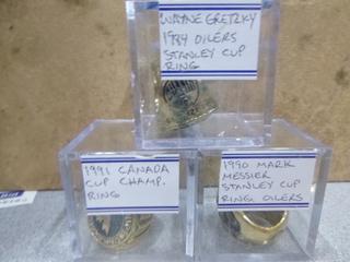 (1) 1984 Wayne Gretzky Stanley Cup  Replica Ring, (1) 1990 Mark Messier Stanley Cup Replica Ring,  (1) 1991 Team Canada Championship  Replica Ring  (Office)