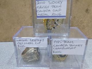 1984 Wayne Gretzky Stanley Cup Replica Ring,  (1)2010 Sidney Crosby Team Canada Gold Medal Replica Ring, (1) 1985 Team Canada Hockey Championship Replica Ring (Office)