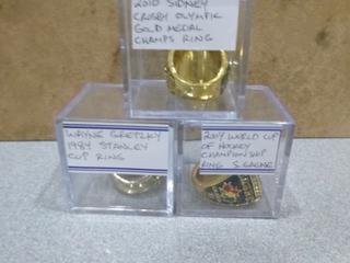 (1) 1984 Wayne Gretzky Stanley Cup Replica Ring, (1) 2004 Sam Gagne World Cup Hockey Championship Replica Ring, (1) Sidney Crosby Olympic Gold Medal Replica  Ring (Office)