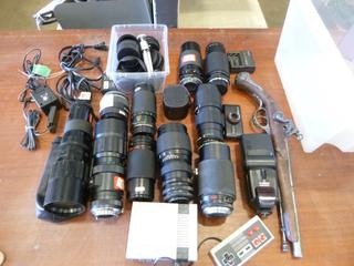 Camera Sundries, Lenses, Caps, Cords, Flash, Cameras, and (1) Pre-Loaded Nintendo System, Replica Toy Gun (D2)