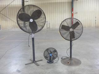 (2) Industrial Pedestal Fans With (1) Small Table Top Fan