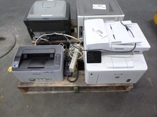 (1) Samsung Xpress Printer, Model M2020W, SN 070MB8GF6D007XV, (1) HP Printer, SN VND3C19349 and (2) Power Bars