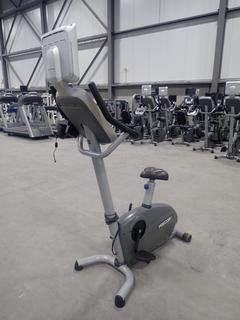 Precor 864i Upright Exercise Bike w/ Cardio Theater LCD Monitor And Adapter. SN AGJZE01060014 *Note: 1 Missing Pedal*