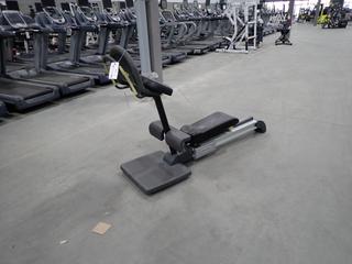 Technogym Flexability Anterior Machine *Note: Tear On Seat*