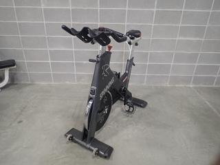 Star Trac Spinner Blade Spin Bike. SN SBEX1311-L01261 *Note: This Item Is Located At 7103 68AVE NW- Location 2*