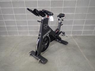Star Trac Spinner Blade Spin Bike. SN SBEX1311-L01259 *Note: This Item Is Located At 7103 68AVE NW- Location 2*