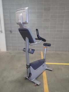 Precor Upright Bike w/ Cardio Theater Monitor. SN A868K17100031 *Note: This Item Is Located At 7103 68AVE NW- Location 2*