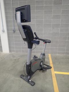 Life Fitness 95C Lifecycle Upright Bike w/ HDTV Monitor. SN ALX103536 *Note: This Item Is Located At 7103 68AVE NW- Location 2*