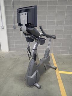 Life Fitness Upright Bike w/ HDTV Monitor. SN CLU101924 *Note: Pedals Unattached, This Item Is Located At 7103 68AVE NW- Location 2*